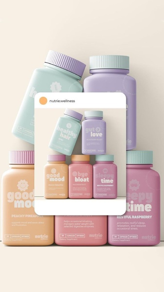 A clean, high-end product hero shot featuring multiple dietary supplement bottles arranged in a balanced, symmetrical composition with a soft-focus pastel background.
